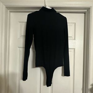 Black Clyque Turtle Neck Body Suit, New with Tag